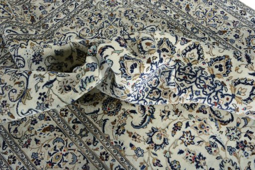 Surface texture of New Kashan rug with natural Wool and intricate pattern
