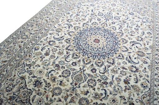 Backside of handmade New Kashan rug showing knot structure and weave density
