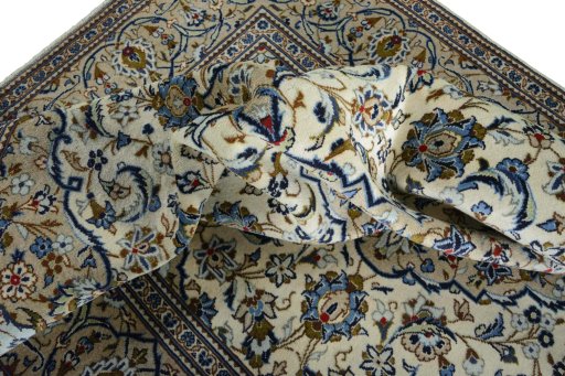 Surface texture of New Kashan rug with natural Wool and intricate pattern