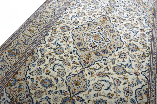 Backside of handmade New Kashan rug showing knot structure and weave density