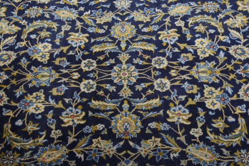 Central medallion detail of 2000s Kashan rug from Iran / Persia