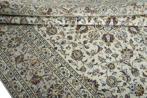 Close-up detail of New Kashan rug from Iran / Persia showing Wool weave