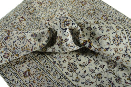 Surface texture of New Kashan rug with natural Wool and intricate pattern