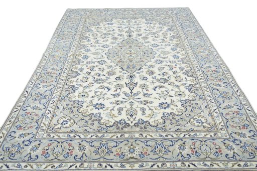 Surface texture of 2000s Kashan rug with natural Wool and intricate pattern