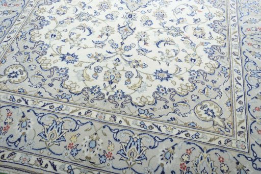 Close-up detail of 2000s Kashan rug from Iran / Persia showing Wool weave