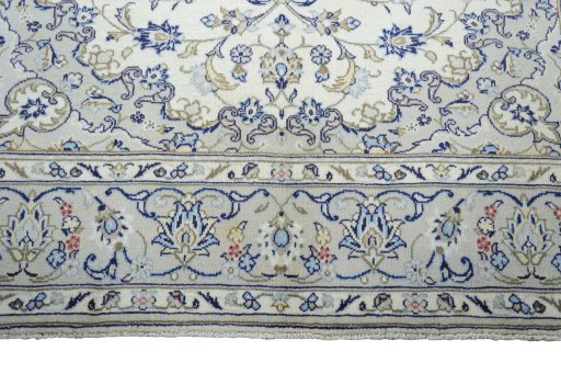 Full view of 2000s Kashan rug from Iran / Persia, 298 × 195 cm in Beige tones