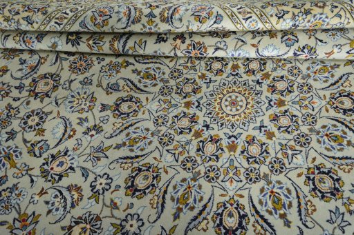 Close-up detail of 2000s Kashan rug from Iran / Persia showing Wool weave
