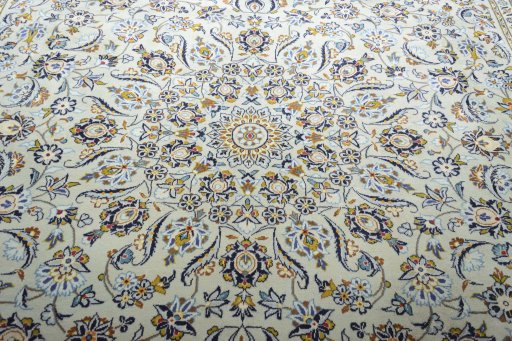 Central medallion detail of 2000s Kashan rug from Iran / Persia