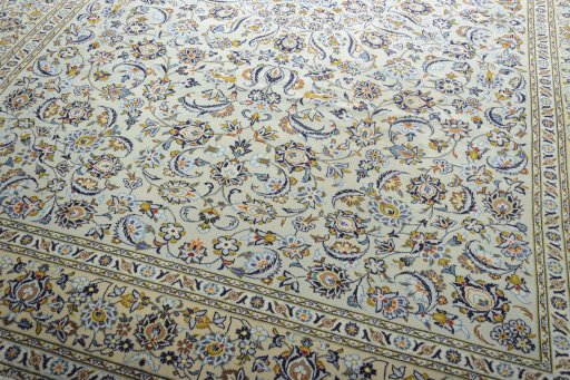 Close-up detail of 2000s Kashan rug from Iran / Persia showing Wool weave