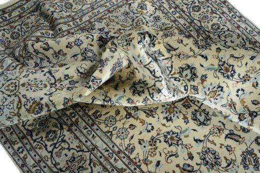 Surface texture of New Kashan rug with natural Wool and intricate pattern