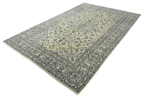 Corner detail of New Kashan rug showing border pattern and Wool pile