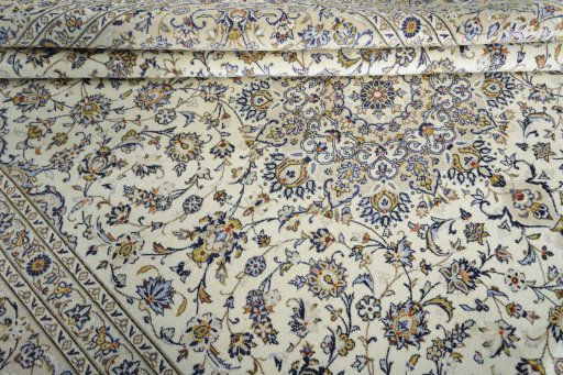 Close-up detail of New Kashan rug from Iran / Persia showing Wool weave