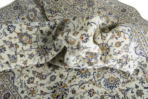 Surface texture of New Kashan rug with natural Wool and intricate pattern