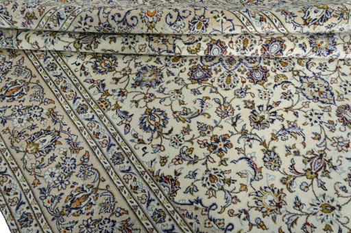 Close-up detail of 2000s Kashan rug from Iran / Persia showing Wool weave