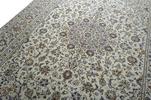 Backside of handmade 2000s Kashan rug showing knot structure and weave density
