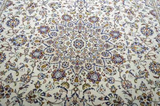 Central medallion detail of 2000s Kashan rug from Iran / Persia