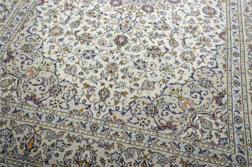 Close-up detail of 2000s Kashan rug from Iran / Persia showing Wool weave