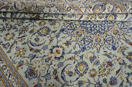 Close-up detail of 2000s Kashan rug from Iran / Persia showing Wool weave