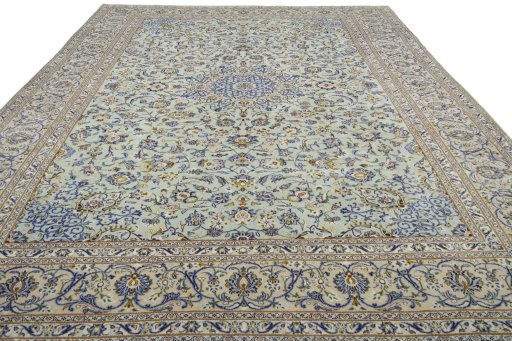 Surface texture of 2000s Kashan rug with natural Wool and intricate pattern