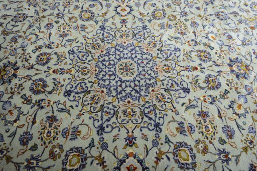 Central medallion detail of 2000s Kashan rug from Iran / Persia