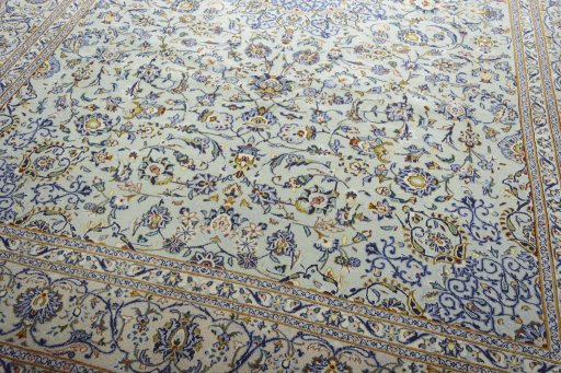 Close-up detail of 2000s Kashan rug from Iran / Persia showing Wool weave