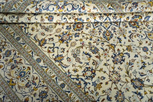 Close-up detail of New Kashan rug from Iran / Persia showing Wool weave