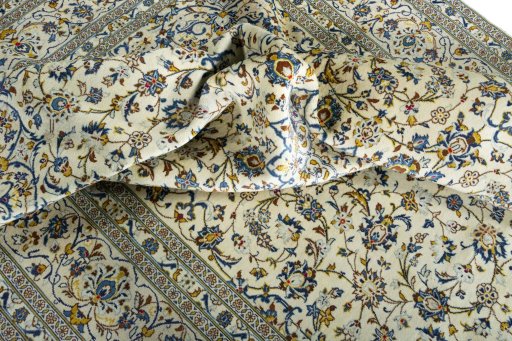 Surface texture of New Kashan rug with natural Wool and intricate pattern