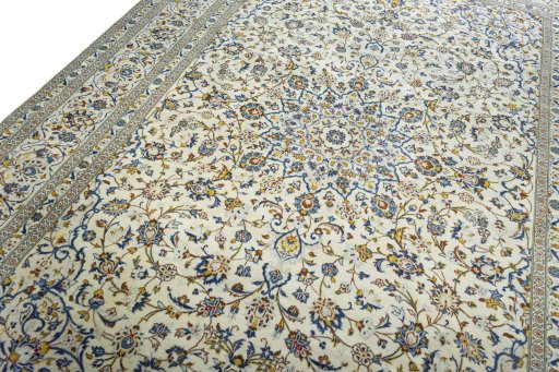 Backside of handmade New Kashan rug showing knot structure and weave density