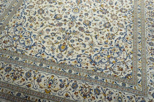 Close-up detail of New Kashan rug from Iran / Persia showing Wool weave