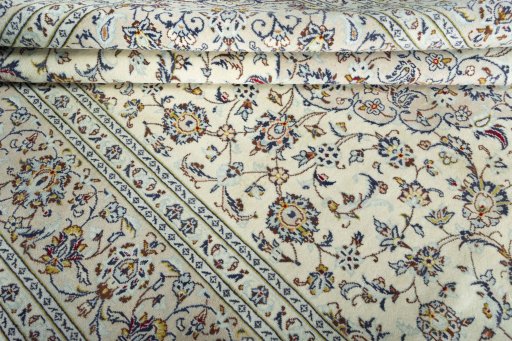 Close-up detail of New Kashan rug from Iran / Persia showing Wool weave