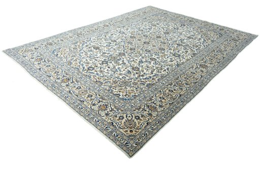 Corner detail of 2000s Kashan rug showing border pattern and Wool pile
