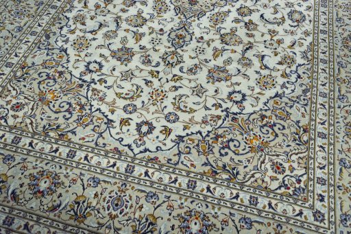 Close-up detail of 2000s Kashan rug from Iran / Persia showing Wool weave