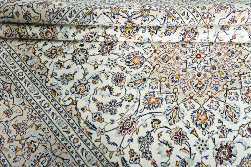 Close-up detail of 2000s Kashan rug from Iran / Persia showing Wool weave