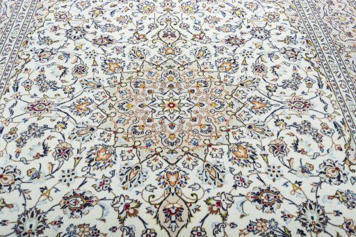 Central medallion detail of 2000s Kashan rug from Iran / Persia