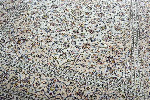 Close-up detail of 2000s Kashan rug from Iran / Persia showing Wool weave