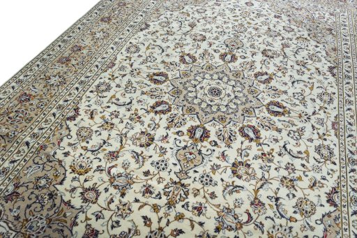 Backside of handmade 2000s Kashan rug showing knot structure and weave density