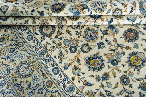 Close-up detail of 2000s Kashan rug from Iran / Persia showing Wool weave
