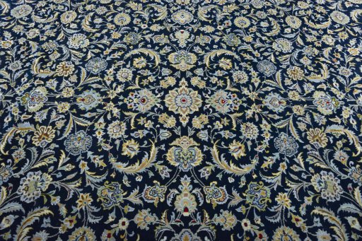 Central medallion detail of 2000s Kashan rug from Iran / Persia