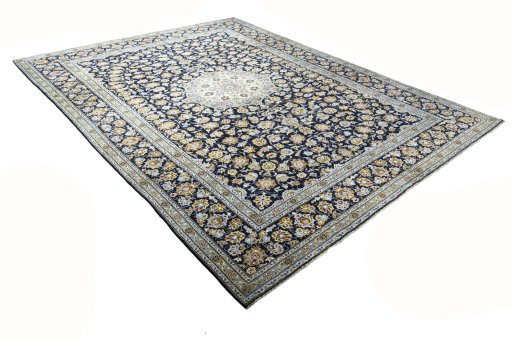 Close-up detail of 2000s Kashan rug from Iran / Persia showing Wool weave
