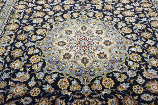 Central medallion detail of 2000s Kashan rug from Iran / Persia