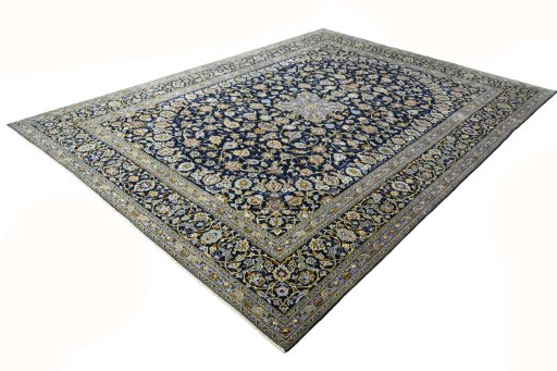 Corner detail of 2000s Kashan rug showing border pattern and Wool pile