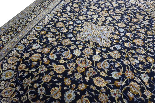 Surface texture of 2000s Kashan rug with natural Wool and intricate pattern