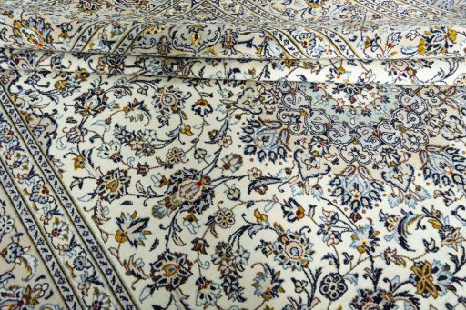 Close-up detail of New Kashan rug from Iran / Persia showing Wool weave