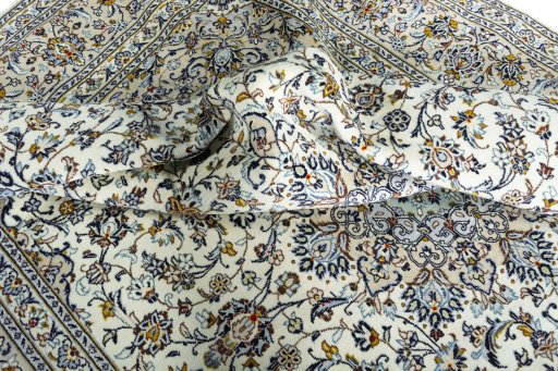 Surface texture of New Kashan rug with natural Wool and intricate pattern