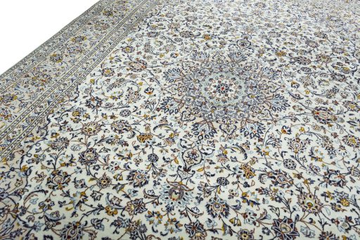 Backside of handmade New Kashan rug showing knot structure and weave density
