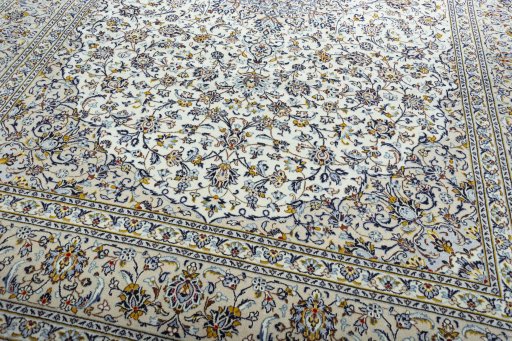 Close-up detail of New Kashan rug from Iran / Persia showing Wool weave