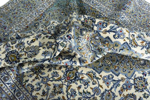 Surface texture of 2000s Kashan rug with natural Wool and intricate pattern