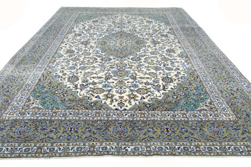 Surface texture of 2000s Kashan rug with natural Wool and intricate pattern