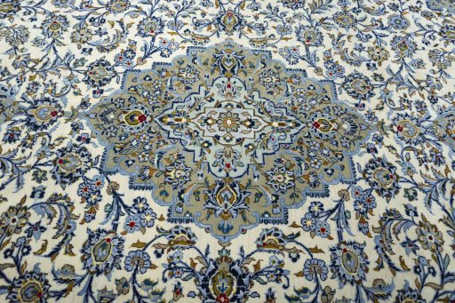 Central medallion detail of 2000s Kashan rug from Iran / Persia