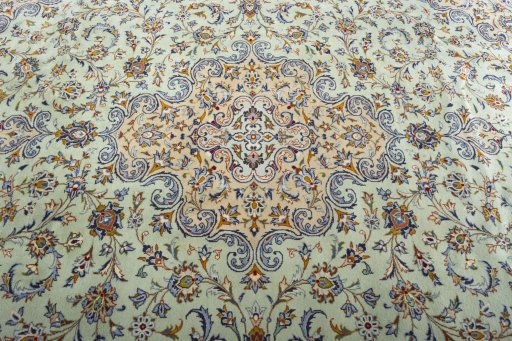 Central medallion detail of 2000s Kashan rug from Iran / Persia